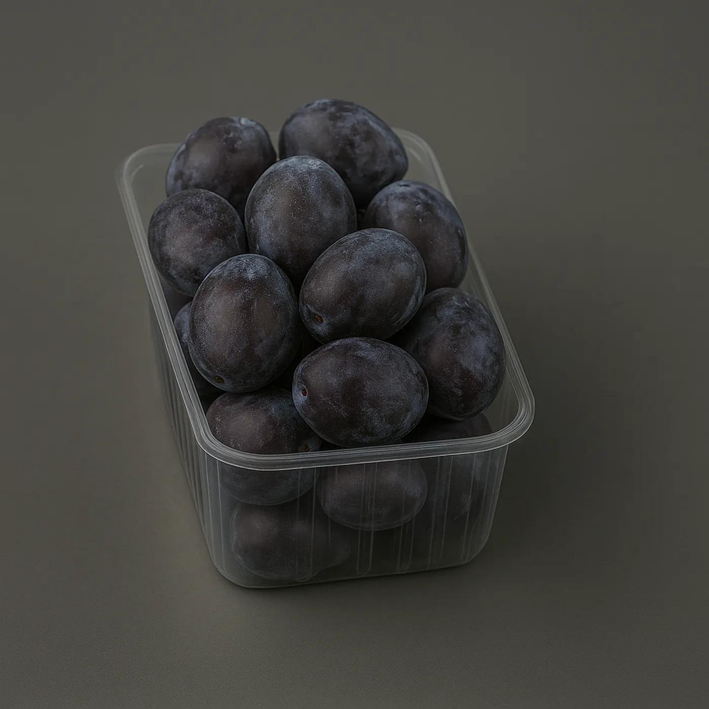 Transparent punnet with plums for retail